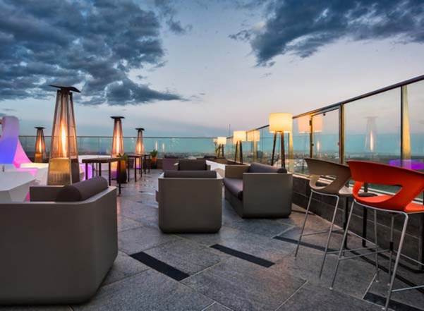Rooftop city skyline views and upscale lounge experience at 15 Rooftop – Adequate Safaris
